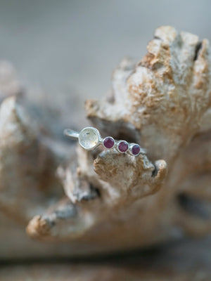 A Rose Cut Labradorite and Garnet Ring in sterling silver