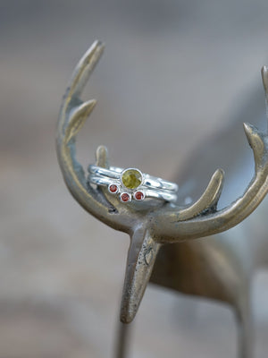 A Yellow Sphene and Garnet Ring Set in recycled sterling silver