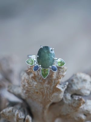 A set of two rings | Sapphire, Peridot, and Opal