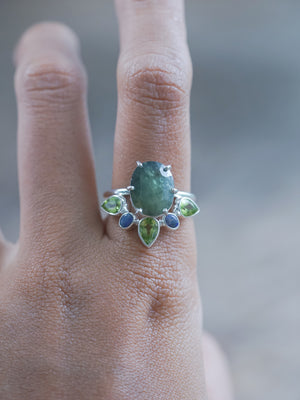 A set of two rings: Sapphire, Peridot, and Opal Ring Set