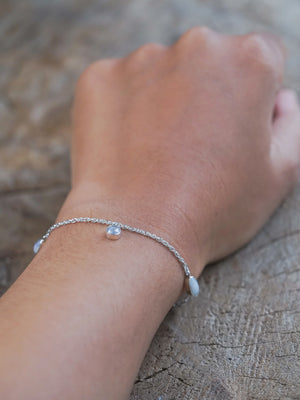 Blue Sapphire and Opal Charm Bracelet in Silver