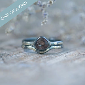 Color Change Garnet Ring Set in Black Gold