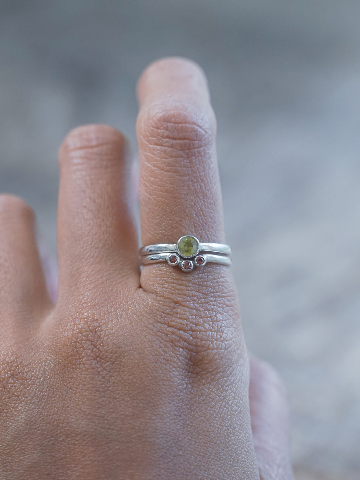 A Sphene and Garnet Ring Set in recycled sterling silver