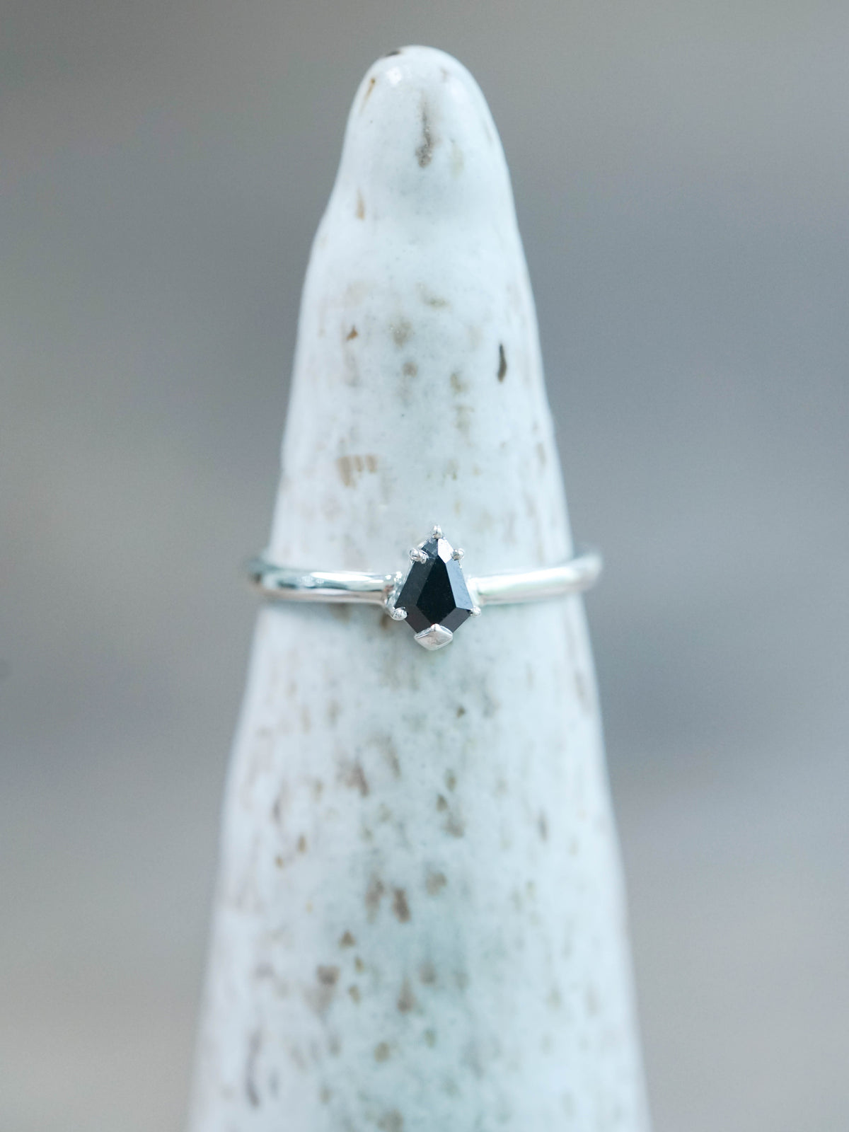 Black Shield cut diamond ring