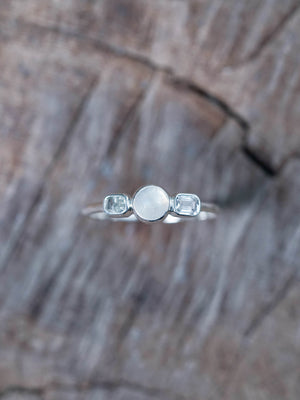 Moonstone and Pale Blue Sapphire Engagement Ring in Sterling Silver