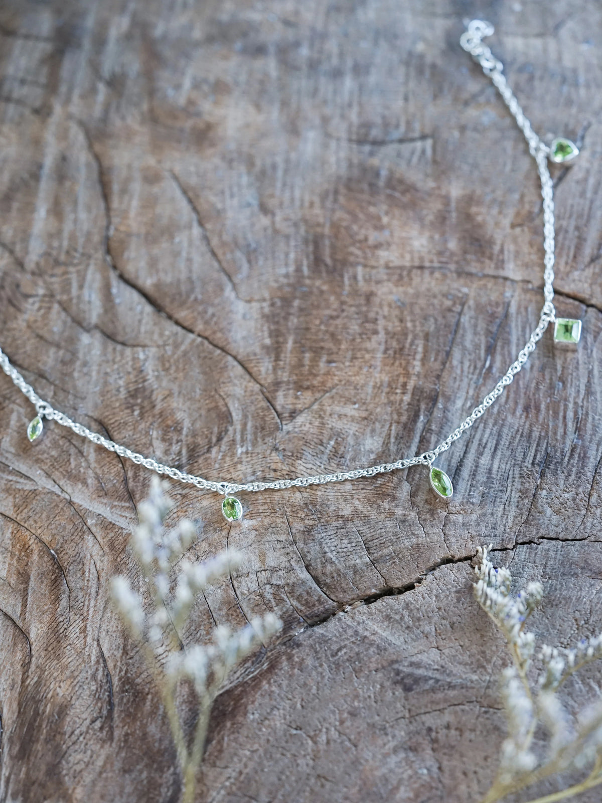 Peridot Charm Bracelet in Sterling Silver