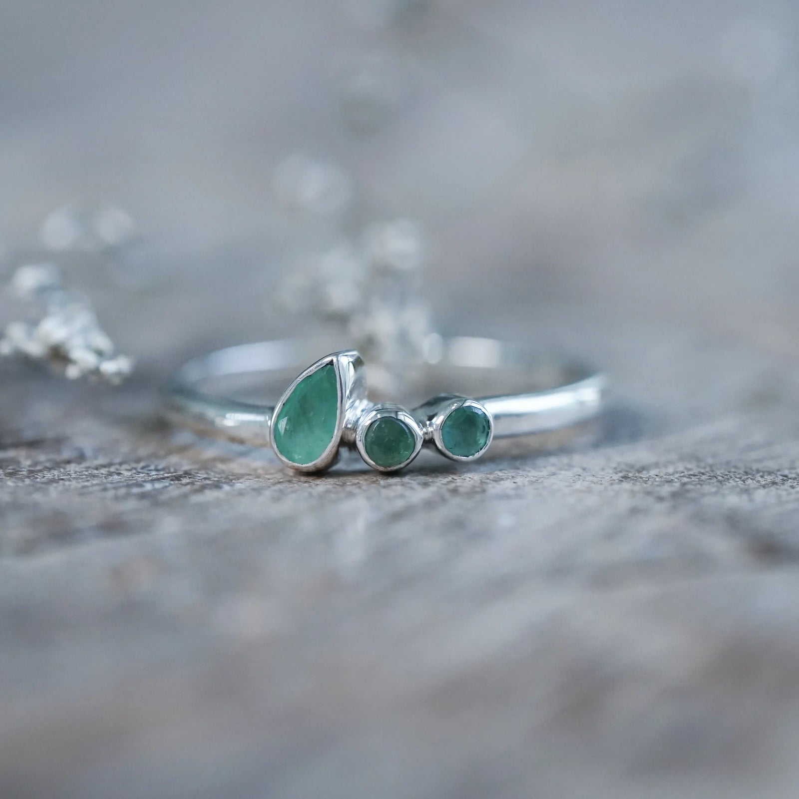 Round and Pear Emerald Ring