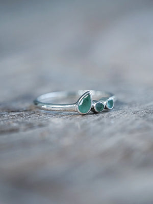 Round and Pear Emerald Ring