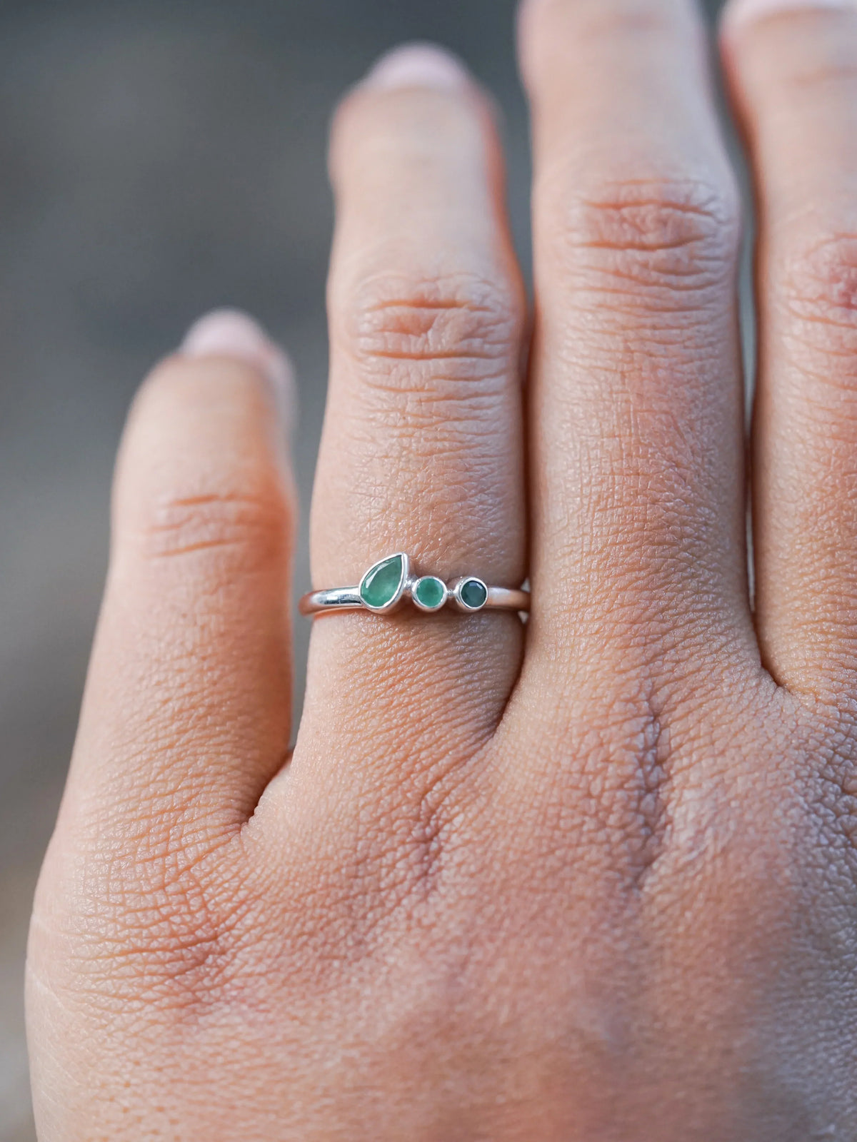 Round and Pear Emerald Ring