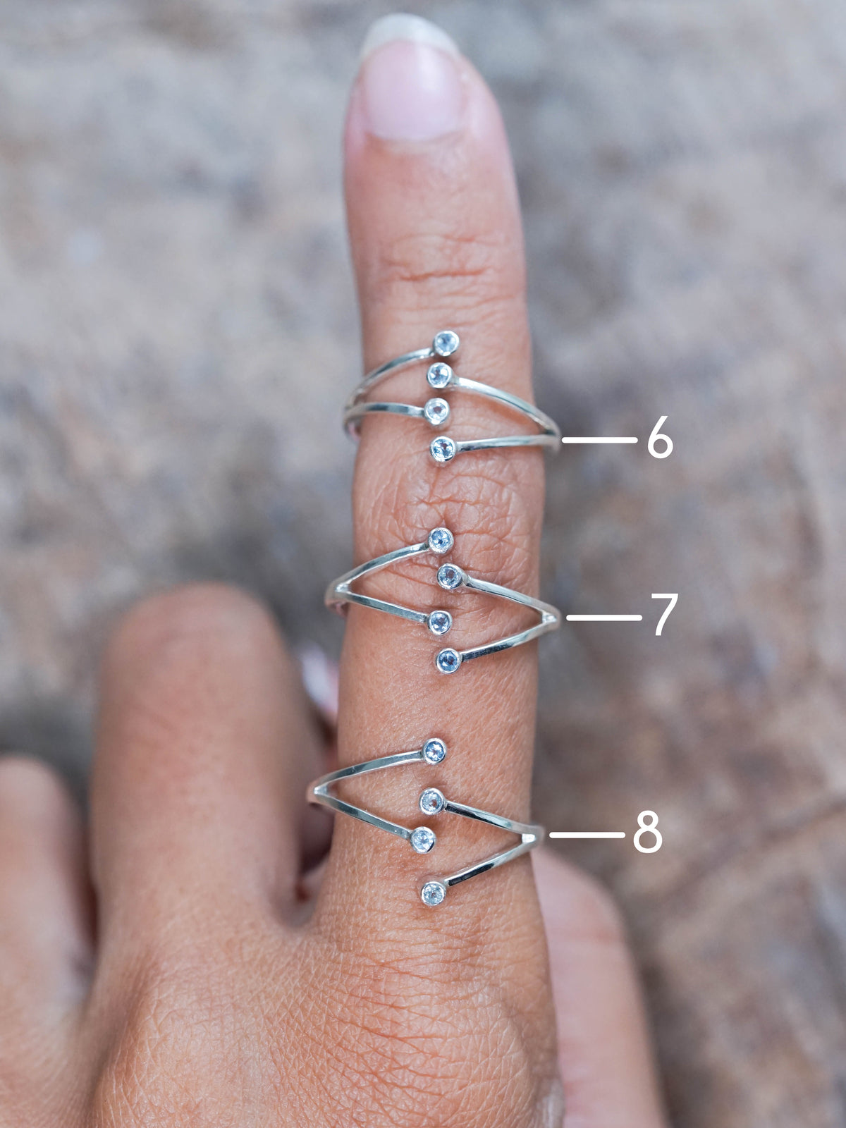 Sterling Silver Open Hug Aquamarine Rings