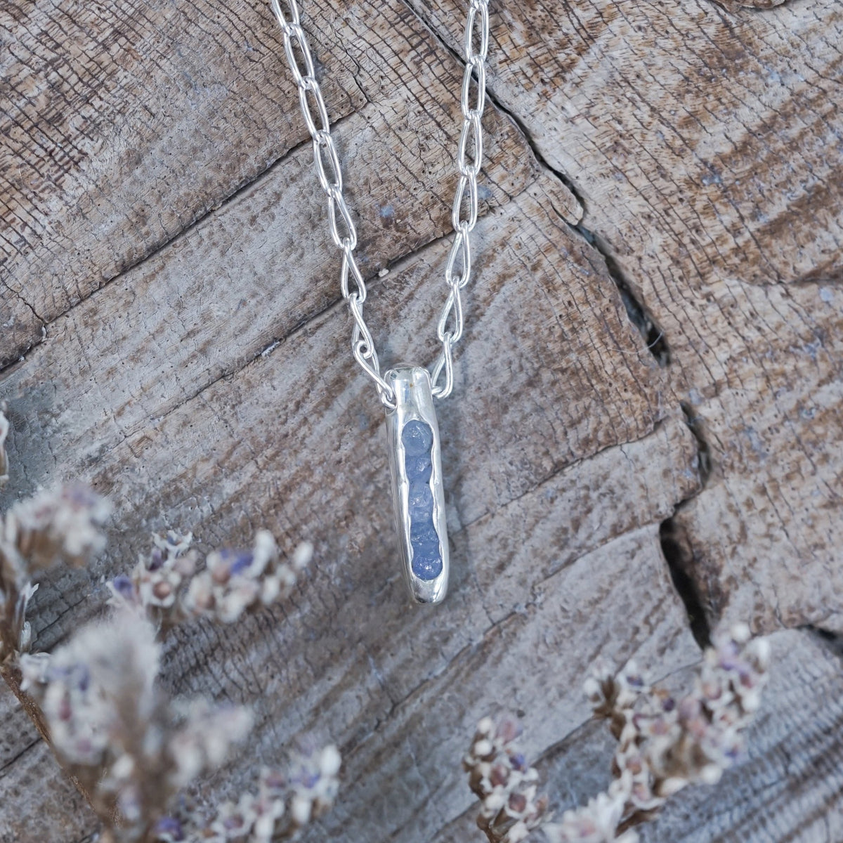 Rough Tanzanite Necklace with Hidden Gems in sterling silver